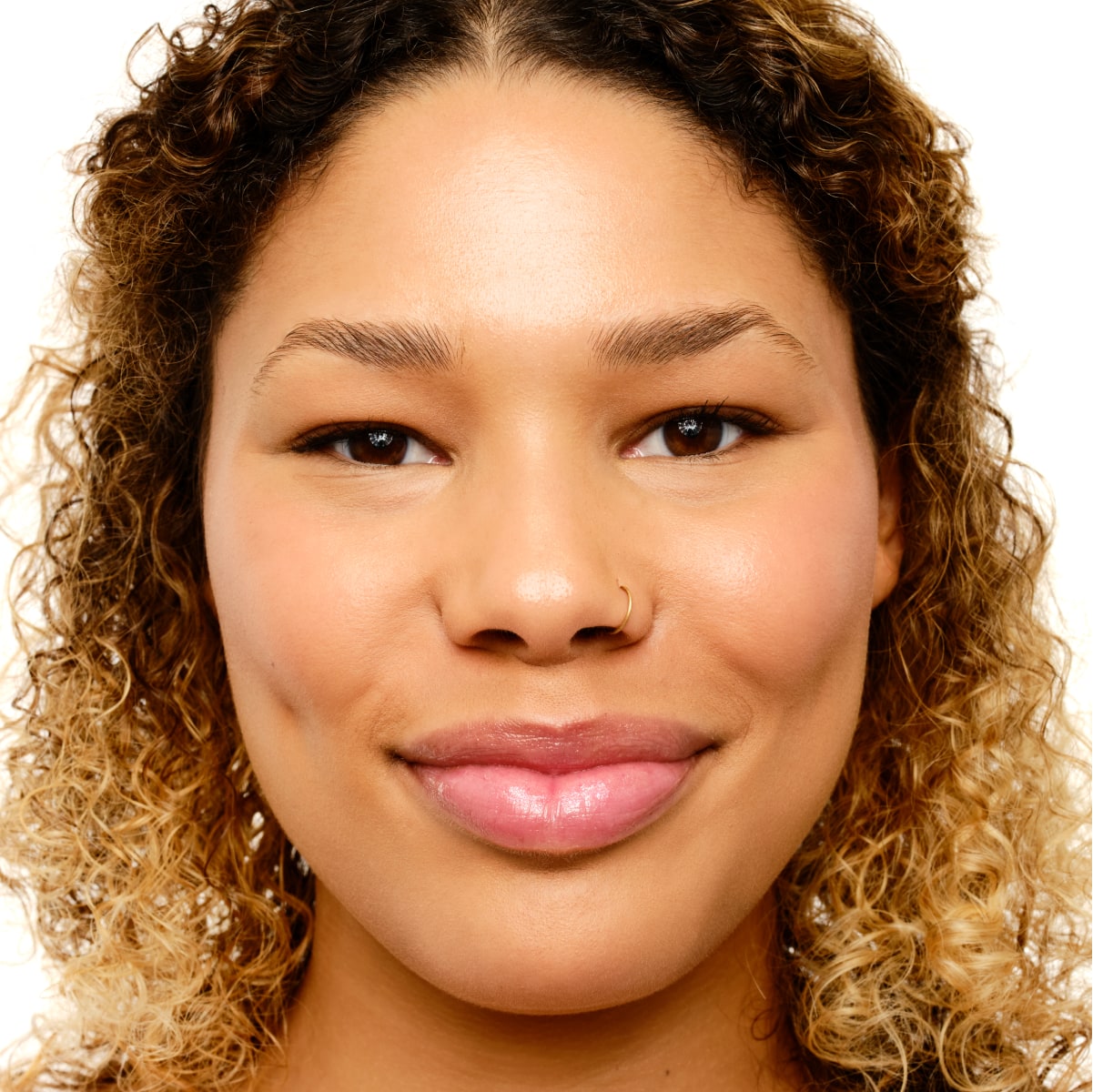 Headshot displaying Warm Sand